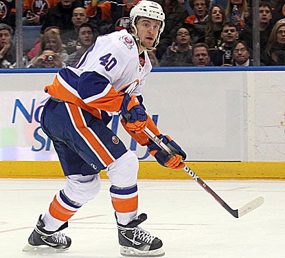 Michael Grabner scores two goals, including the go-ahead score, to lead the Islanders over the Sabres. (US Presswire)