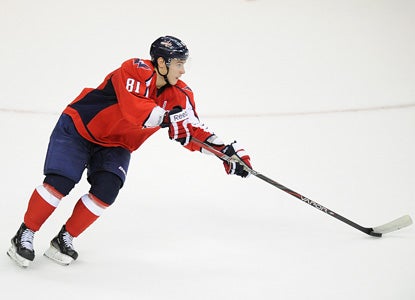 Rookie defenseman Dmitry Orlov scores the winner, his first NHL goal. (Getty Images)