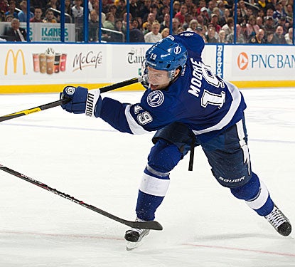 Dominic Moore's goal with 3:45 remaining in regulation breaks a 3-3 tie and lifts the Lightning to victory.  (Getty Images)