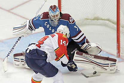 Colorado's Jean-Sebastien Giguere denies ex-Avalanche winger Tomas Fleischmann for one of his 23 saves.  (Getty Images)