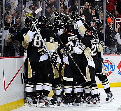 Somewhere in that mob is Penguins star Evgeni Malkin, fresh off scoring his winning goal against the Capitals on Sunday.  (Getty Images)