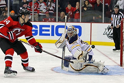 Ryan Miller turns away Adam Henrique's shootout try to help Buffalo win its first game on the road since Dec. 3. (US Presswire)