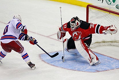 Martin Brodeur denies the Rangers' last chance in the shootout by stopping NHL All-Star MVP Marian Gaborik. (US Presswire)