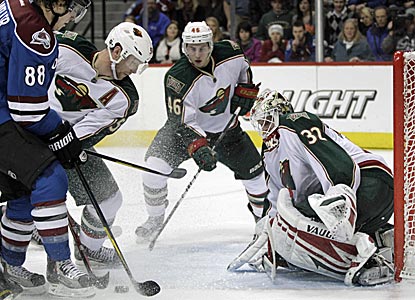 Minnesota goalie Niklas Backstrom stops 37 shots to record his third shutout of the season.  (AP)