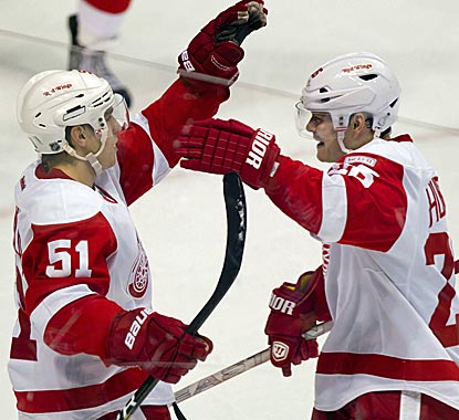 Jiri Hudler (right) scores in regulation and in the SO to help Detroit improve to 6-0 in shootouts this season.  (AP)