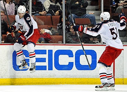 The Blue Jackets' Derick Brassard (left) celebrates his winning goal in overtime with Fedor Tyutin. (Getty Images)