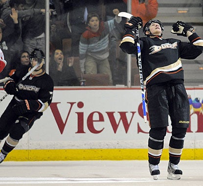 Corey Perry celebrates his overtime goal, which gives Anaheim its eighth win in the last 11 games. (AP)
