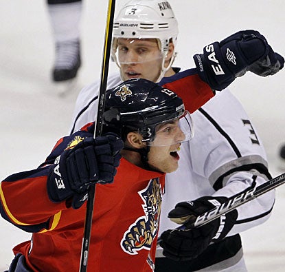 Mike Santorelli does his part with a goal to help the Panthers beat the Kings for the first time in eight games. (AP)