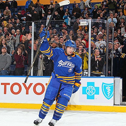Nathan Gerbe scores the winning goal in the fifth round of a shootout for the Sabres.  (Getty Images)