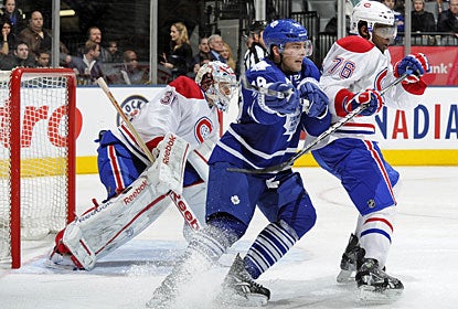 Carey Price keeps a good eye on the puck on this night, stopping 32 shots for his fourth shutout. (Getty Images)
