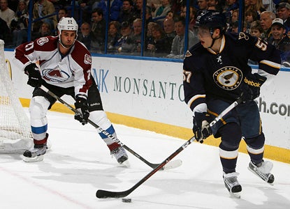 David Perron's pair of goals and assist helps set up the Blues to topple the Avs in overtime. (Getty Images)