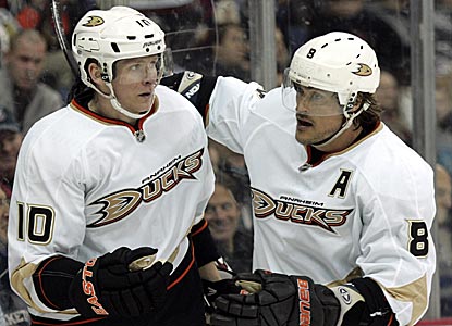 Anaheim's Corey Perry (left) helps keep the Ducks' slim playoff hopes alive with a hat trick.  (AP)