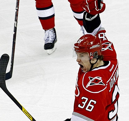 Jussi Jokinen reacts to what is the eventual game winner after he deflects the puck past Thomas Greiss. (AP)