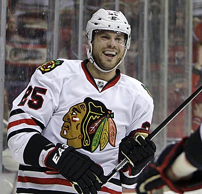 The Blackhawks' Viktor Stalberg scores his eighth goal of the season against the Blue Jackets, half of his season total.  (AP)