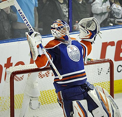 Oilers goalie Devan Dubnyk celebrates his shutout over the Flyers, Edmonton's second consecutive victory.  (AP)