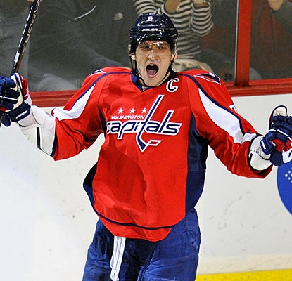 Alex Ovechkin celebrates after scoring a goal in the second period against the Canadiens. (AP)