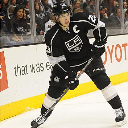 Despite being the subject of trade rumors, Dustin Brown matches a career best with four points in the Kings' victory.  (US Presswire)