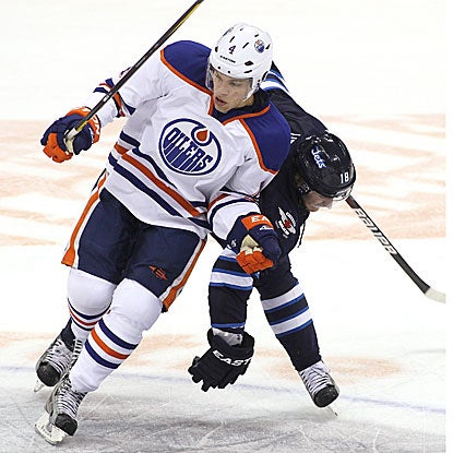 Taylor Hall scores one of the Oilers' four third-period goals in their win against the Jets.  (Getty Images)