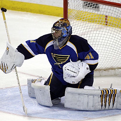 Jaroslav Halak wins his sixth straight start to lift the Blues over the Blackhawks and move atop the NHL.  (AP)