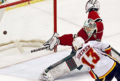 Olli Jokinen scores a goal as the Flames move into an eighth-place tie with the Avalanche.  (AP)