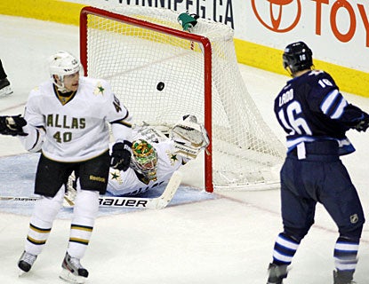 Andrew Ladd tallies two goals as Winnipeg deals Dallas its first regulation loss since Feb. 19. (US Presswire)