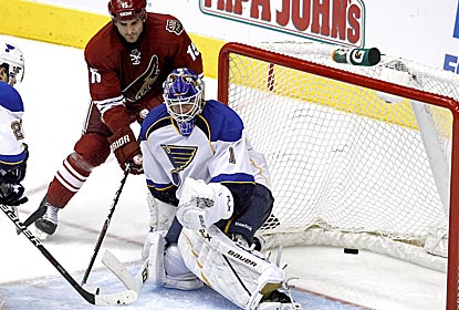 Brian Elliott makes one of his 20 saves as St. Louis ties a record with its 14th shutout of the year.  (AP)