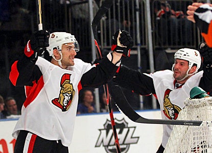 The Senators' Nick Foligno (left) celebrates after his game-tying goal in the third period against the Rangers. (Getty Images)