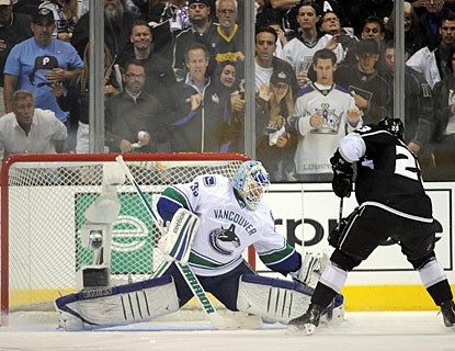 Cory Schneider is almost perfect in Game 4, stopping 43 shots, including a penalty shot by Dustin Brown. (Getty Images)