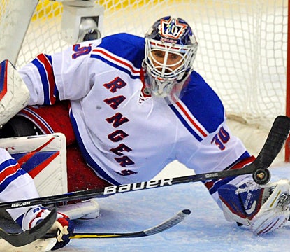Henrik Lundqvist makes a save during the second period against the Senators. (AP)
