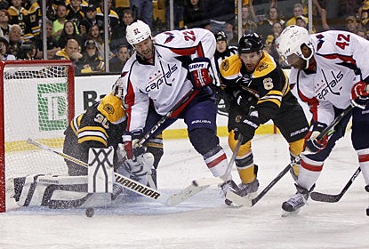 Joel Ward (42) finds a rebound down low and backhands the puck past Boston goalie Tim Thomas in overtime. (US Presswire)