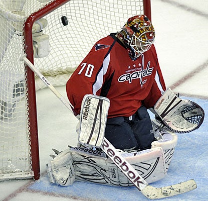 After 114:41 minutes of play and 47 saves, Braden Holtby is beaten by Marian Gaborik's shot.  (AP)
