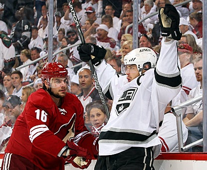 Dustin Brown celebrates after scoring his seventh goal of the playoffs and first against the Coyotes in the West finals. (Getty Images)