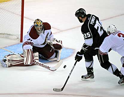 Mike Smith makes 36 saves and registers his third playoff shutout to help the Coyotes avoid elimination. (US Presswire)