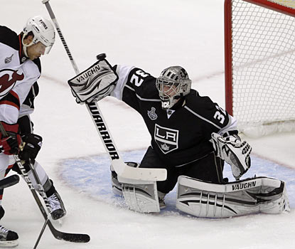 Jonathan Quick deflects a shot and finishes with 22 saves as the Kings annihilate the Devils in Game 3. (AP)