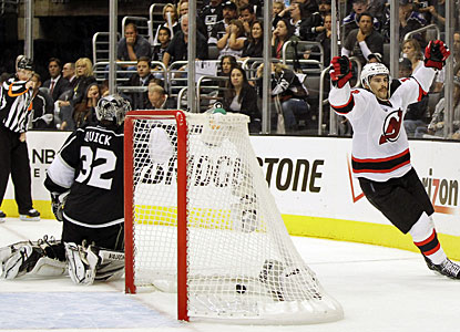 Adam Henrique's fourth goal of the postseason comes at just the right time for New Jersey. (AP)