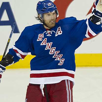 The Rangers' Ryan Callahan scores a power-play goal in the third period before exiting the game with an injury. (AP)