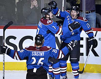 Colorado's Milan Hejduk (23) scores a goal in his 1,000th NHL game, but the Avs fall to the Stars. (US Presswire)