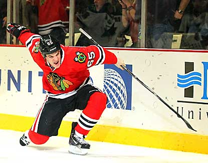 Chicago center Andrew Shaw scores in the second period as the Blackhawks remain unbeaten in regulation. (US Presswire)