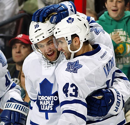 Clarke MacArthur (16) and Nazem Kadri are all smiles after MacArthur puts Toronto up 3-0 in the second period. (Getty Images)