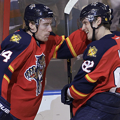 Tomas Fleischmann (left) sores the go-ahead goal (the 100th for his career) to help the Panthers defeat the Penguins. (AP)