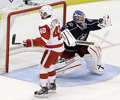 Columbus goalie Sergei Bobrovsky celebrates after clinching the victory with a stop on Henrik Zetterberg in the shootout.  (AP)