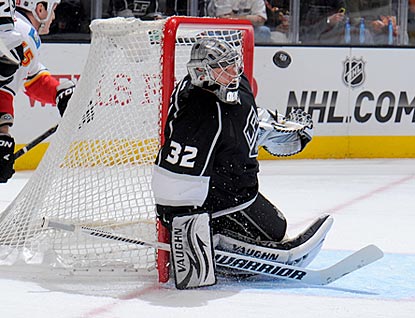 Jonathan Quick makes this save and 22 others to help the Kings earn their 11th victory in their past 14 games.  (Getty Images)