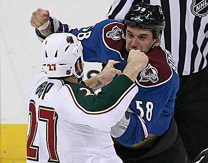 Colorado's Patrick Bordeleau and Minnesota's Mike Rupp square off during a chippy first period that features four Wild goals. (USATSI)