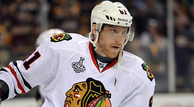Hossa makes big impact for Hawks in return