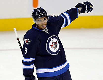 Evander Kane scores a goal with two assists as Winnipeg opens its home slate with a 5-3 win over the Kings. (USATSI)