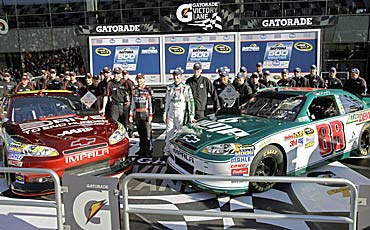 Jeff Gordon (left center) and Dale Earnhardt Jr. (right center) qualified for Daytona 500's front row. (AP)