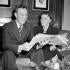 In this April 20, 1948, file photo, John Wooden, newly announced head basketball coach at UCLA, is shown with his wife, Nell, at their home in Terre Haute, Ind. (AP Photo, File)