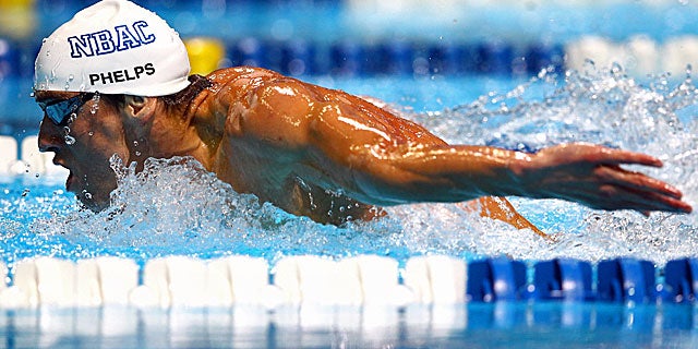 Phelps completes the 200 meter in his signature stroke in 1:53.65. (Getty Images)