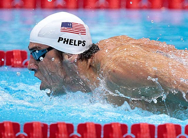 Phelps wins his morning heat at the Aquatics Center, but barely qualifies for the 400 IM final. (Getty Images)