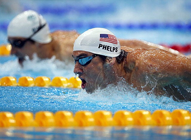 Phelps finishes third in his heat on Monday morning, good for fifth overall in 200 fly qualifying. (Getty Images)